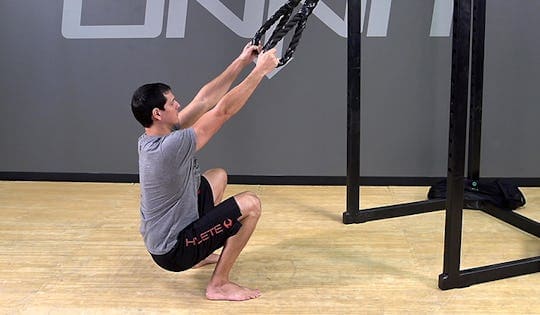 assisted squat Assisted squat technique demonstration for beginners in 30-30 squat challenge