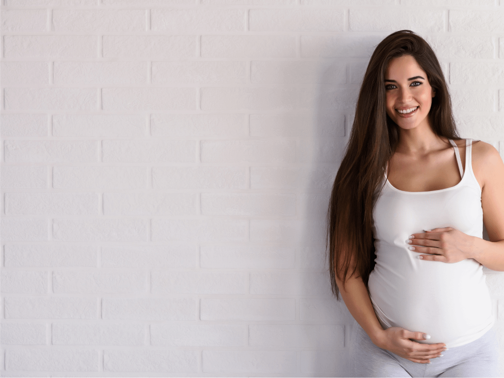 Active pregnant mother benefiting from maternity chiropractic care in Hamilton ON